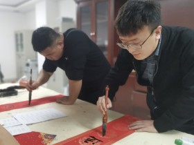 墨香迎新春 万福送进门——suncitygroup太阳新城开展“送万福 进万家”书法公益活动